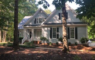 Professional house painters meticulously create impressive exterior transformations in Cary, NC.- how long is the drying time for exterior paint